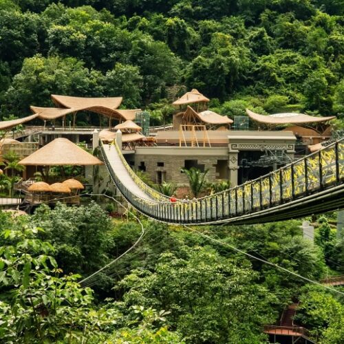 suspended-wooden-bridge-in-green-mountain-valley-hainan-island